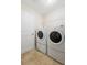 Bright laundry room equipped with a washer and dryer at 2136 J Lawson Blvd, Orlando, FL 32824