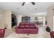 Open floor plan showcasing the living room, dining area, and kitchen with dark cabinetry at 2136 J Lawson Blvd, Orlando, FL 32824