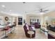 Spacious living room with tile floors, comfortable leather seating, and ample natural light at 2136 J Lawson Blvd, Orlando, FL 32824