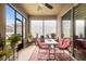Enclosed patio with comfortable seating and ample natural light, perfect for relaxation and entertaining at 2136 J Lawson Blvd, Orlando, FL 32824