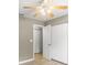 Cozy bedroom features wood-look tile flooring and closet space at 2312 Ne 32Nd Pl, Ocala, FL 34479