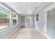 Bright Florida room featuring tile floor and lots of windows at 2312 Ne 32Nd Pl, Ocala, FL 34479
