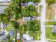 Aerial view showing the location of the home and surrounding trees at 2312 Vivada St, Orlando, FL 32803