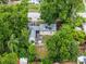 Property with mature trees and outdoor seating area, seen from an aerial perspective at 2312 Vivada St, Orlando, FL 32803