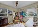 Bright bedroom featuring hardwood floors, ample natural light, and stylish decor at 2312 Vivada St, Orlando, FL 32803