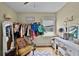 Cozy bedroom featuring hardwood floors, natural light, and vanity at 2312 Vivada St, Orlando, FL 32803