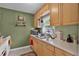 Cozy kitchen features wood cabinets and plenty of counter space at 2312 Vivada St, Orlando, FL 32803
