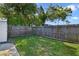 Fenced backyard featuring a grassy area for outdoor activities and privacy, perfect for relaxation at 233 E Church Ave, Longwood, FL 32750