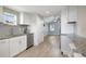This kitchen features stainless steel appliances and granite countertops at 233 E Church Ave, Longwood, FL 32750