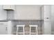 Charming kitchen area with granite countertop and seating at 233 E Church Ave, Longwood, FL 32750