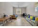 Bedroom featuring tile flooring, a bed, a sofa, and a desk at 2518 Hayden Valley St, Apopka, FL 32703