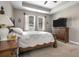 Spacious bedroom with carpeting, a ceiling fan, and a decorative dresser at 2518 Hayden Valley St, Apopka, FL 32703
