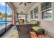 Covered patio with seating and view of the pool at 2518 Hayden Valley St, Apopka, FL 32703