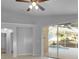 Spacious living room with sliding glass doors and view to the backyard pool at 2643 Alamosa Pl, Lake Mary, FL 32746