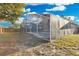 Screened pool surrounded by lawn and the home's exterior at 2643 Alamosa Pl, Lake Mary, FL 32746