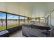 Screened back porch with a jacuzzi and views of the lake at 2681 Debany Rd, Kissimmee, FL 34744