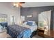 Cozy main bedroom with private patio and en-suite bathroom at 2681 Debany Rd, Kissimmee, FL 34744