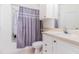 Bright bathroom featuring shower and tub combination, neutral paint and vanity at 2717 Maitland Crossing # 207, Orlando, FL 32810