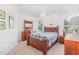 Comfortable bedroom with a ceiling fan, large windows and a walk-in closet at 2717 Maitland Crossing # 207, Orlando, FL 32810