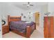 Comfortable bedroom with a ceiling fan, large window and a walk-in closet at 2717 Maitland Crossing # 207, Orlando, FL 32810