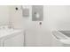 Bright laundry area with white washer and dryer units at 2717 Maitland Crossing # 207, Orlando, FL 32810