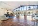 Bright lounge area with large windows, stylish furniture, and neutral decor creates a welcoming space at 2924 S Semoran Blvd # D2, Orlando, FL 32822