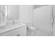 Clean bathroom with white vanity, quartz countertops, and modern fixtures at 296 Famagusta Dr, Davenport, FL 33896