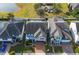A stunning neighborhood with two-story homes, beautiful landscaping, and a lake nearby at 3310 Stonewyck St, Orlando, FL 32824