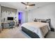 Cozy bedroom featuring a desk, TV, and neutral color palette at 3310 Stonewyck St, Orlando, FL 32824