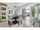 Bright dining room featuring tiled floors, view to outdoor patio, and a built in wine rack at 3310 Stonewyck St, Orlando, FL 32824