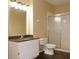 Bathroom with a shower, granite countertop vanity, and tile floors at 413 Summit Ridge Pl # 215, Longwood, FL 32779