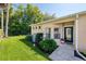 Landscaped backyard with lush lawn and garden creating a private outdoor oasis at 432 Harbor Winds Ct, Winter Springs, FL 32708
