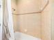 Bright bathroom featuring tiled shower with neutral colors, and a shower curtain at 432 Harbor Winds Ct, Winter Springs, FL 32708