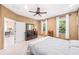 Inviting bedroom with plush carpet, dresser, natural light and access to a comfortable sitting area at 432 Harbor Winds Ct, Winter Springs, FL 32708