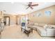Spacious living room with tile flooring, ample seating, and plenty of natural light at 432 Harbor Winds Ct, Winter Springs, FL 32708