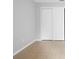 Bedroom with tile flooring, closet, and neutral wall paint at 4636 Fern Pine Dr, Orlando, FL 32808