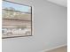 Bedroom featuring neutral walls and tile flooring with a window for natural light at 4636 Fern Pine Dr, Orlando, FL 32808