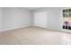 Bedroom with tile floors, closet, and patio access at 4636 Fern Pine Dr, Orlando, FL 32808