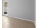 The bedroom features neutral walls, tile flooring, and a glass paneled door leading to the outside at 4636 Fern Pine Dr, Orlando, FL 32808
