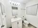 Bathroom with modern vanity, updated fixtures, and tile flooring at 509 Grove Ave, Orlando, FL 32805