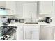 Updated kitchen featuring stainless steel appliances and ample counter space at 509 Grove Ave, Orlando, FL 32805