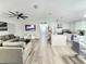 Open-concept living space connects the living room to the kitchen, perfect for entertaining at 509 Grove Ave, Orlando, FL 32805