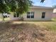 Backyard featuring a patio and view of the rear of the home at 5236 Shale Ridge Trl, Orlando, FL 32818