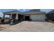 Charming home features a two-car garage, beautiful brick driveway, and a covered porch, blending comfort and curb appeal at 5391 Park Guell St, St Cloud, FL 34771