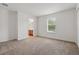 Bedroom featuring a window, closet, and doorway at 5525 Oakworth Pl, Sanford, FL 32773
