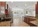 Well-lit kitchen featuring granite counters, stainless steel appliances, tile backsplash, and ample cabinets at 5525 Oakworth Pl, Sanford, FL 32773