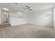 Large living room with stairs and a ceiling fan at 5525 Oakworth Pl, Sanford, FL 32773