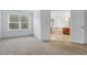 Main bedroom leading into Primary bath with soaking tub and large window at 5525 Oakworth Pl, Sanford, FL 32773