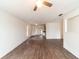 Sunlit living room with wood floors, light walls, and an open layout at 6345 Hatcher Rd, Lakeland, FL 33811