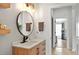 Well-lit bathroom with modern fixtures, stylish vanity, and bright neutral color palette at 6542 Lake Pembroke Pl, Orlando, FL 32829
